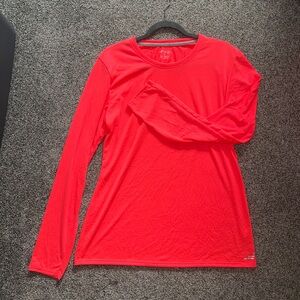 Very bright neon coral long sleeve athletic shirt. Perfect condition.